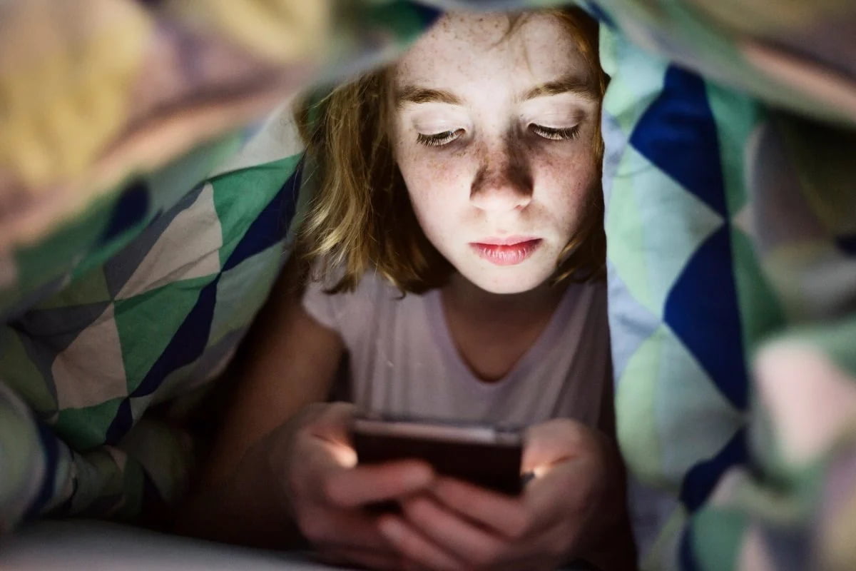 child using phone