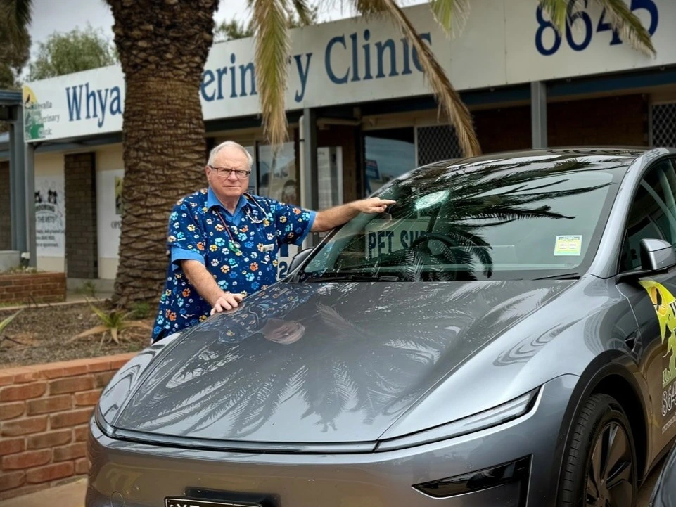 Andrew-Melville-with-his-Tesla-Model-y-that-was-hit-by-a-suspected-meteor-on-October-19-2025
